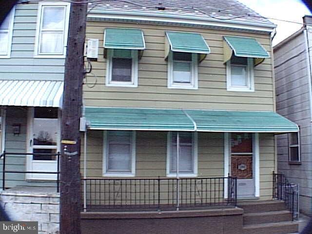 210 S SHERMAN STREET