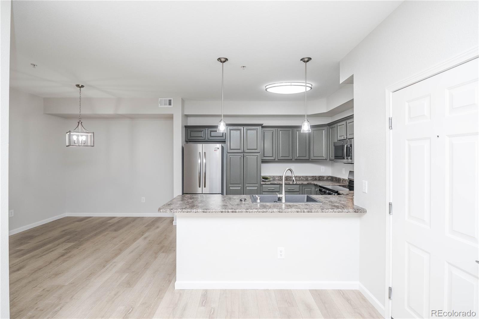 8779 S Kipling Way Unit: 102