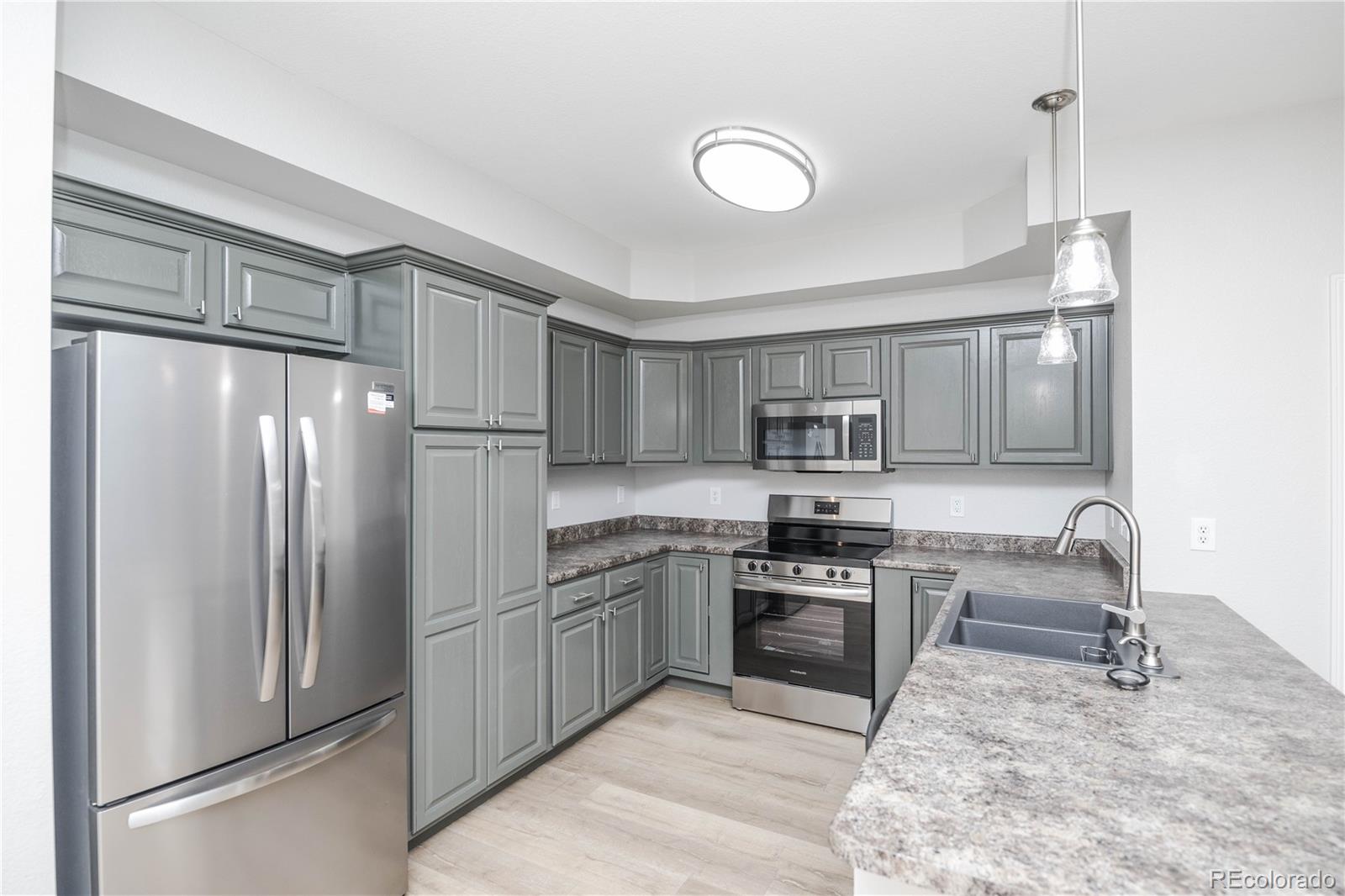 8779 S Kipling Way Unit: 102