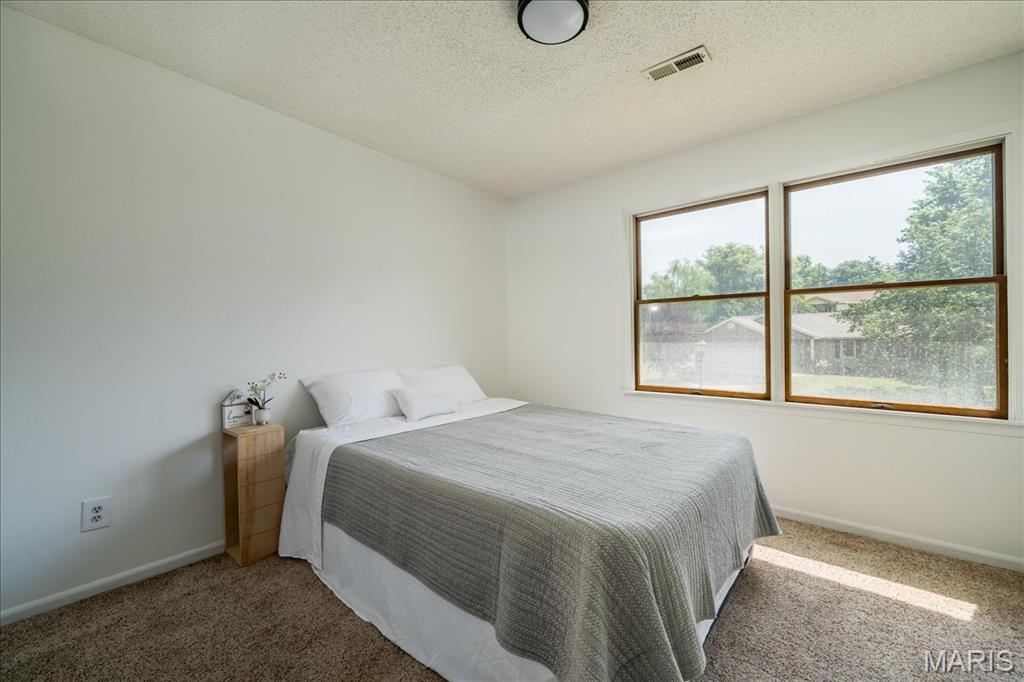 25 Whispering Oaks Drive