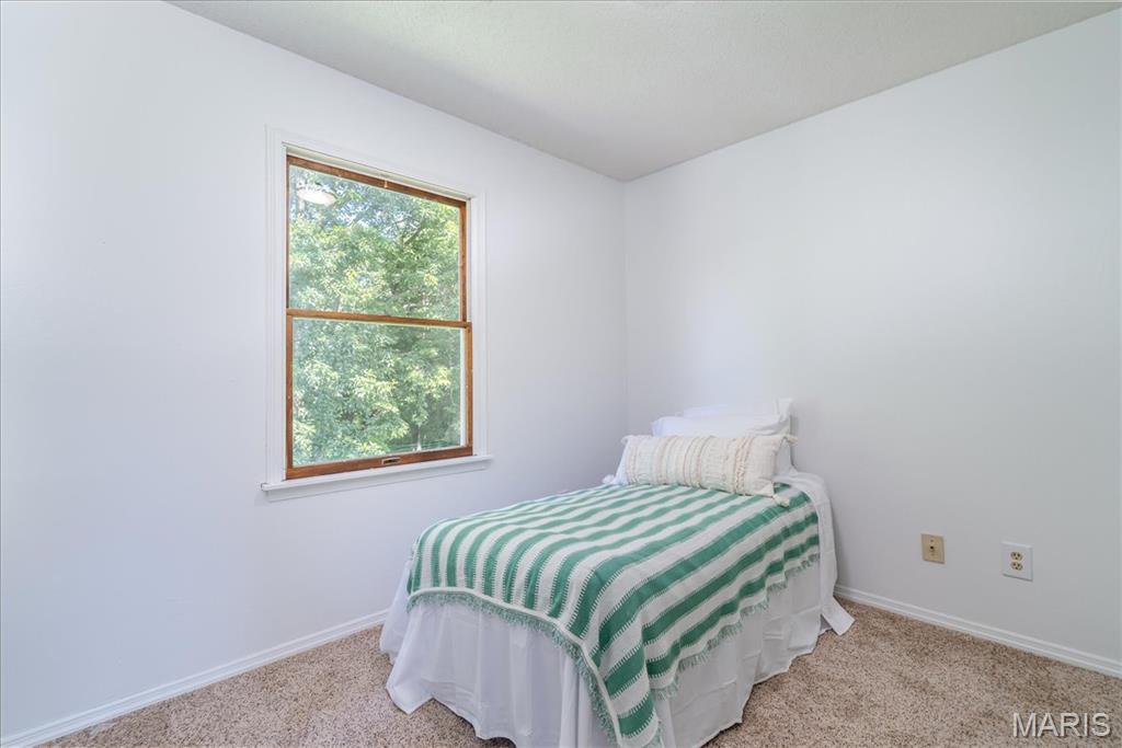 25 Whispering Oaks Drive
