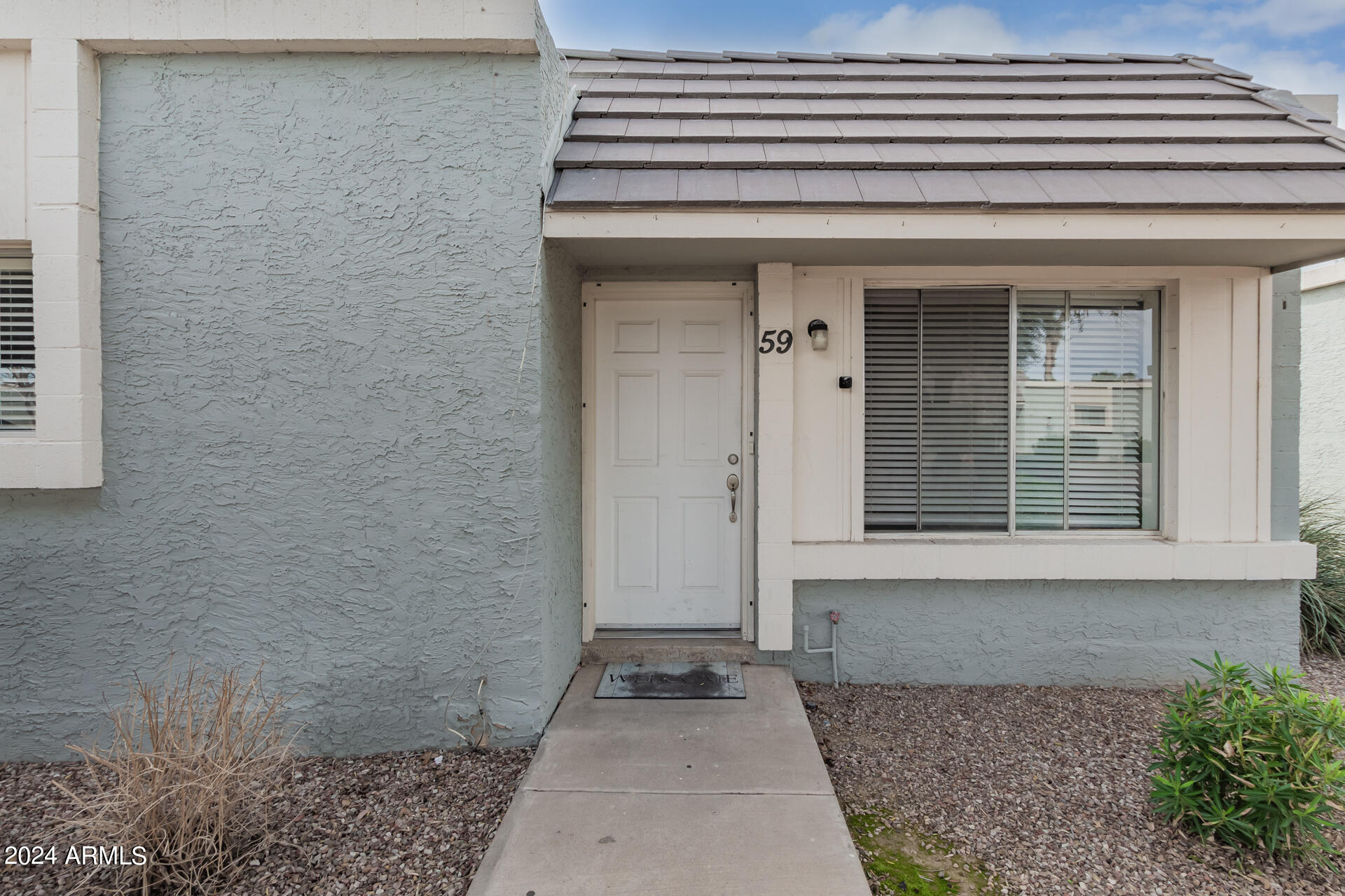 1050 S STAPLEY Drive, 59