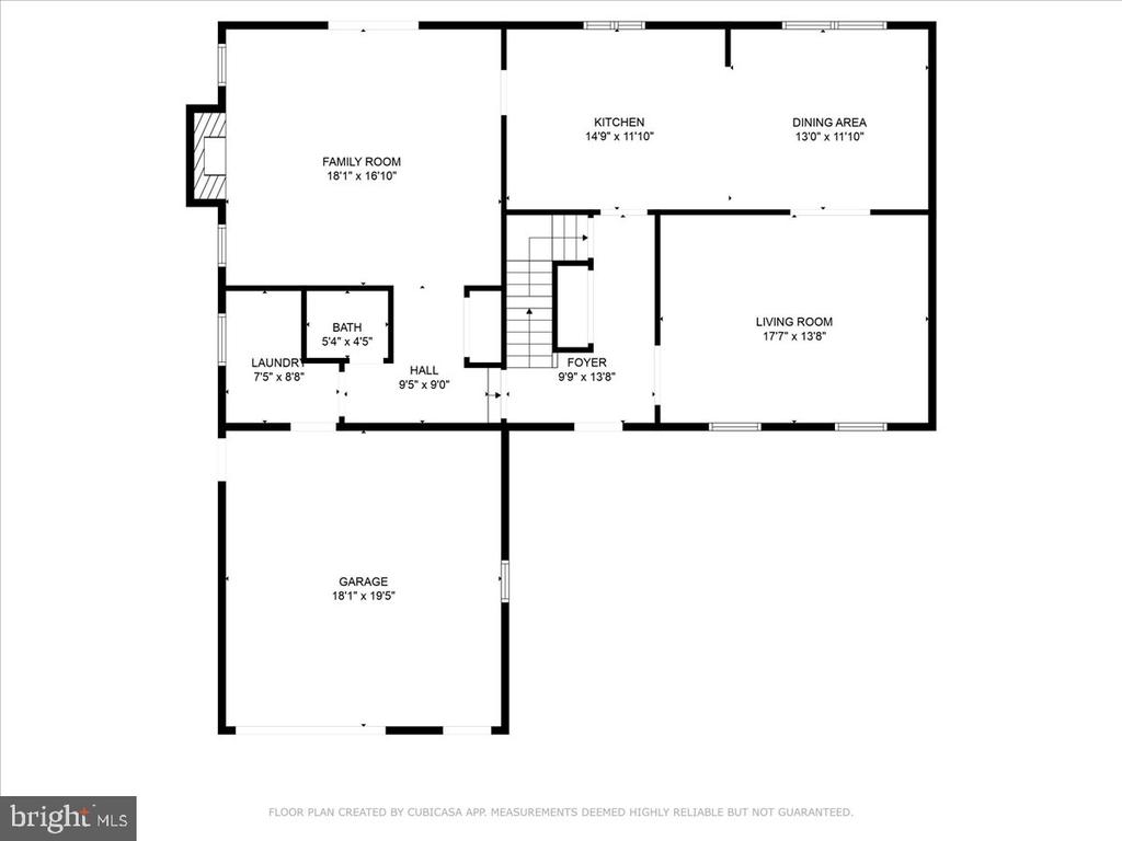 Floor plan with labeled room layouts and dimensions, including a family room, kitchen, living room and garage.