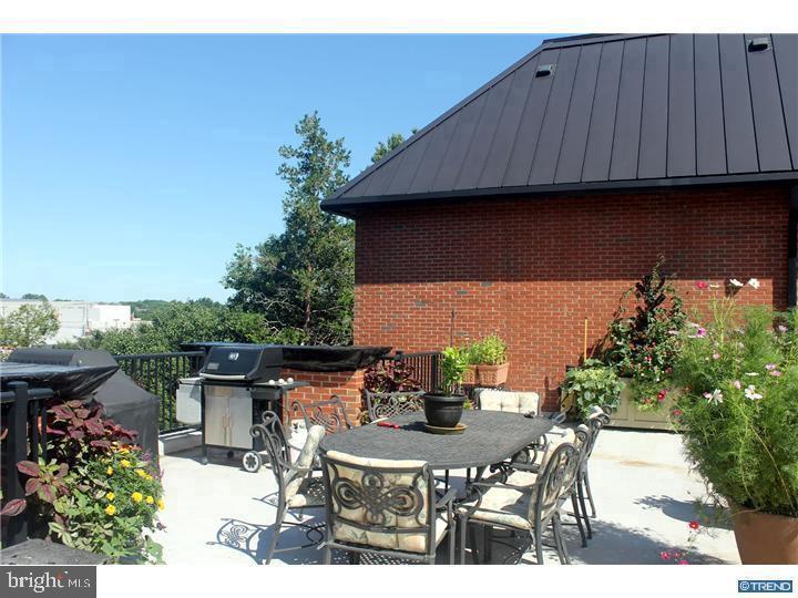 113 E MAIN STREET Unit: 207