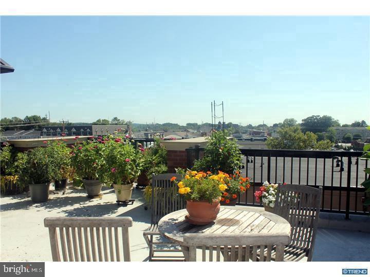 113 E MAIN STREET Unit: 207