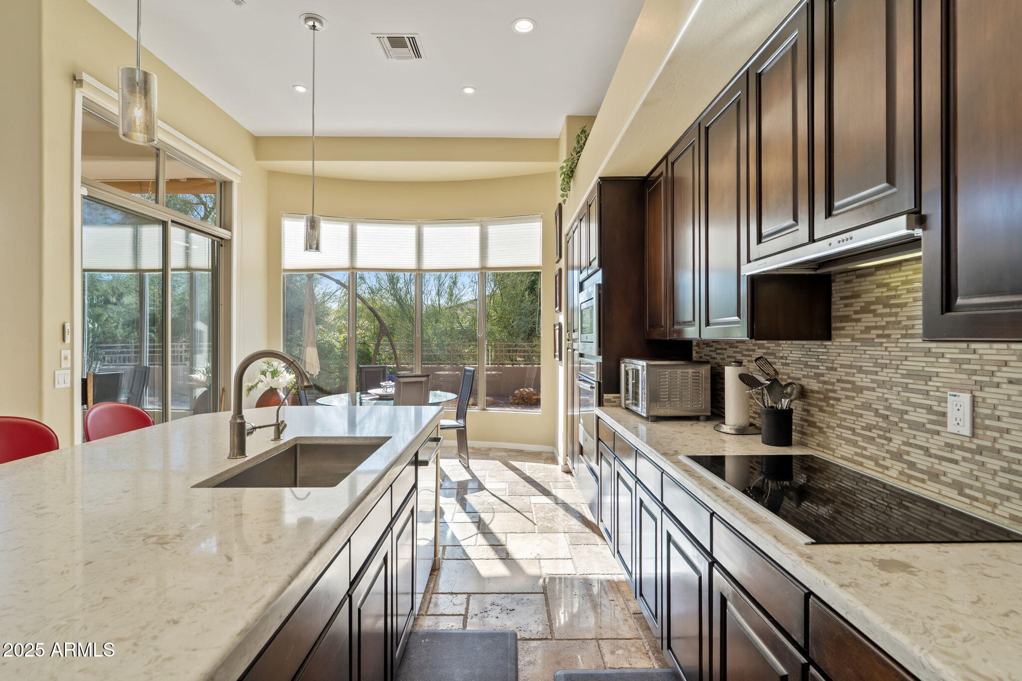 7699 E FLEDGLING Drive