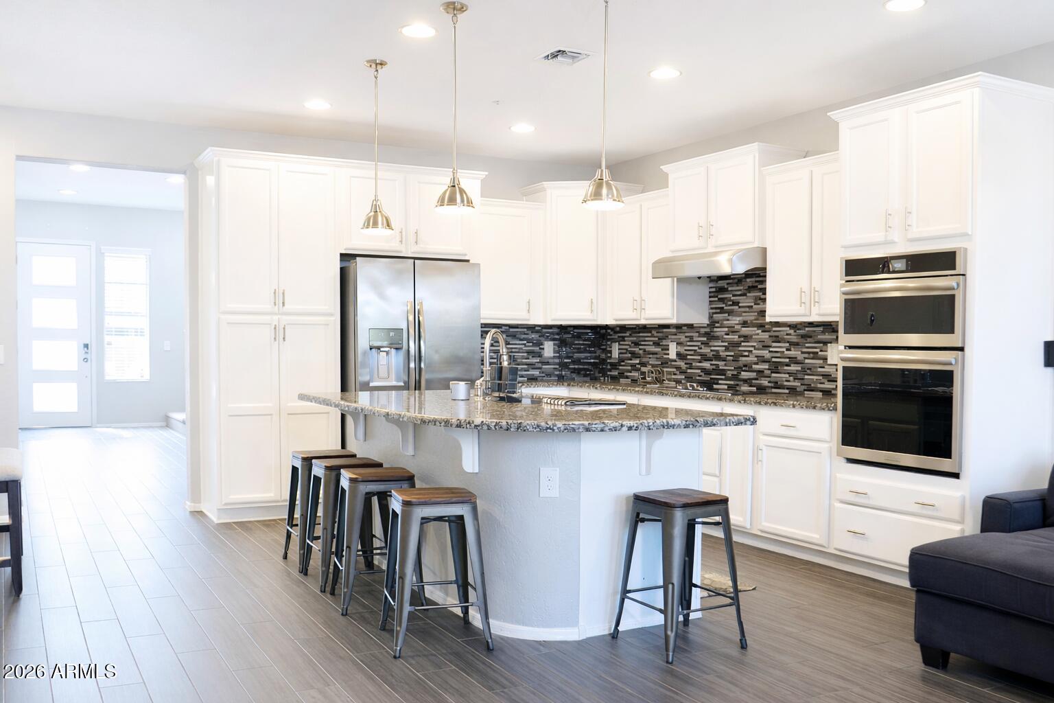 12812 W CARAVEO Place