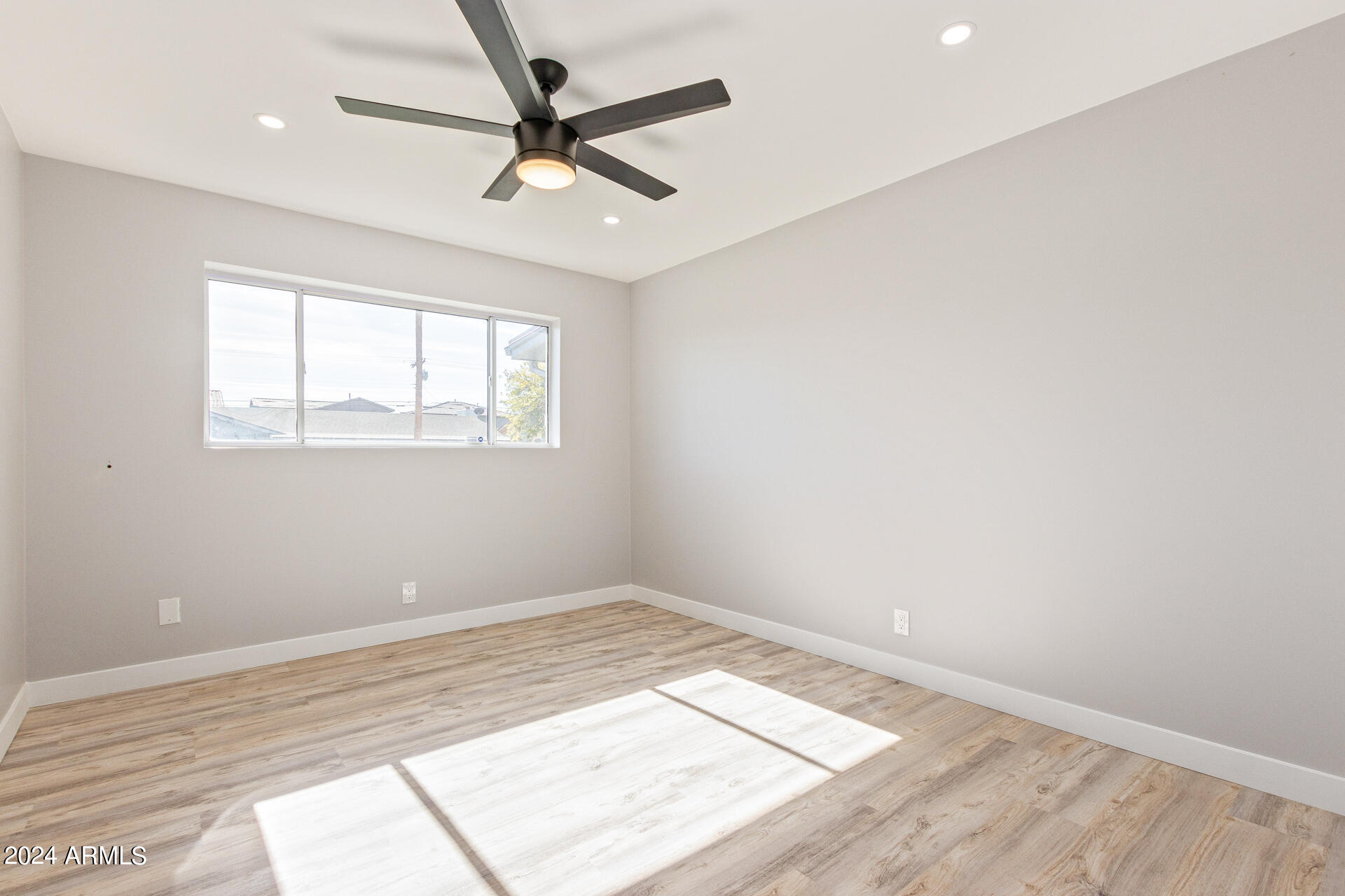 7008 E LATHAM Street