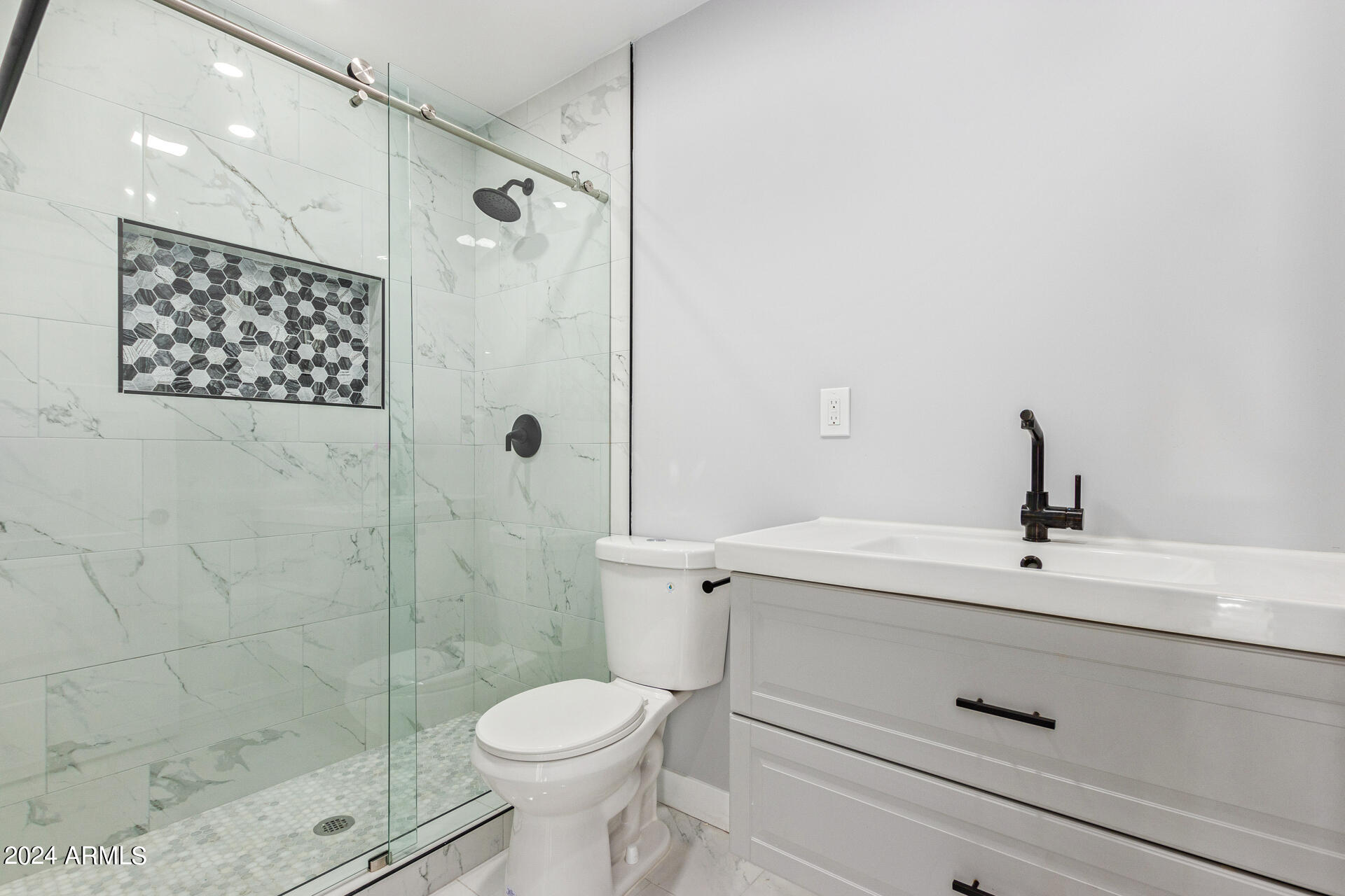 7008 E LATHAM Street