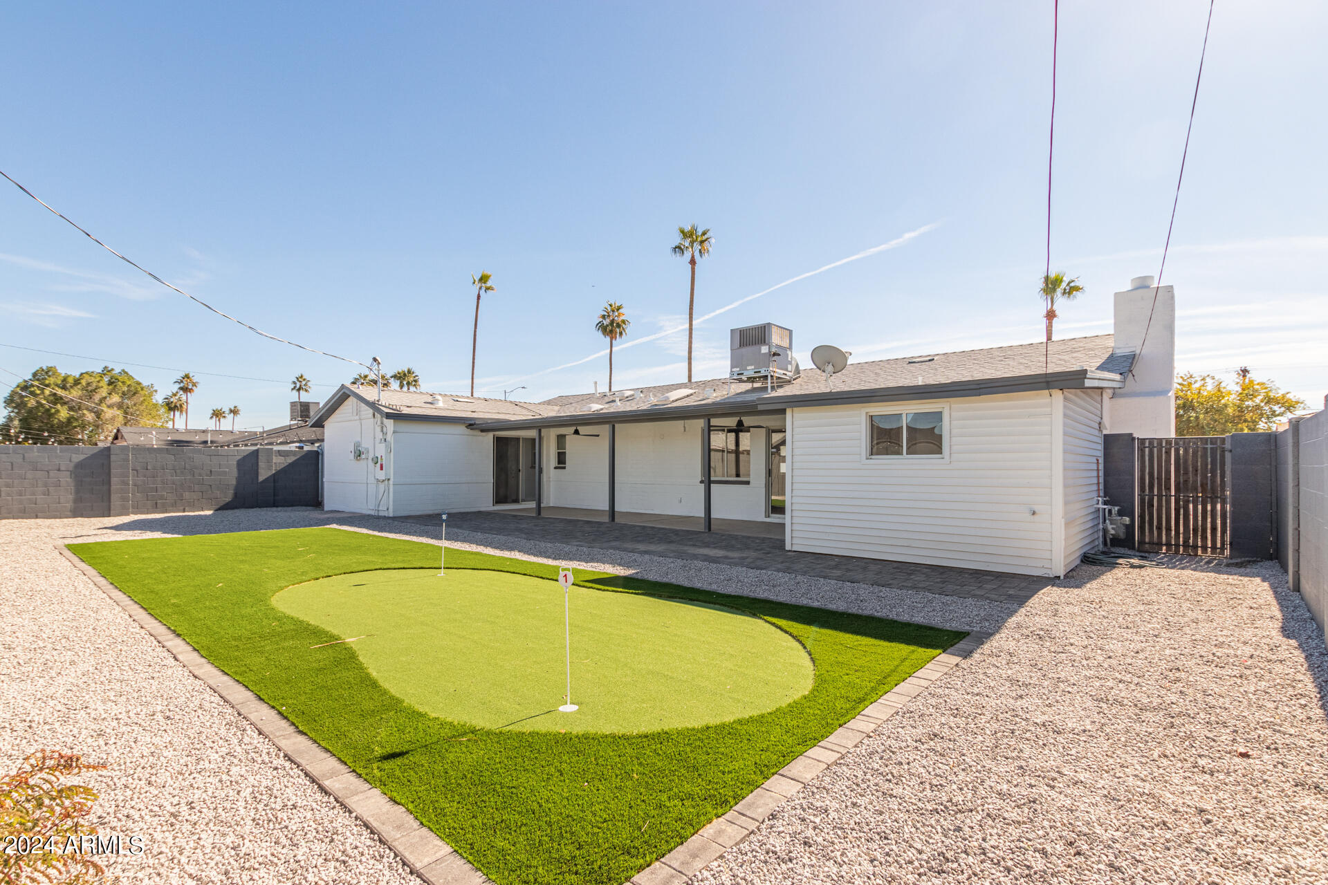 7008 E LATHAM Street