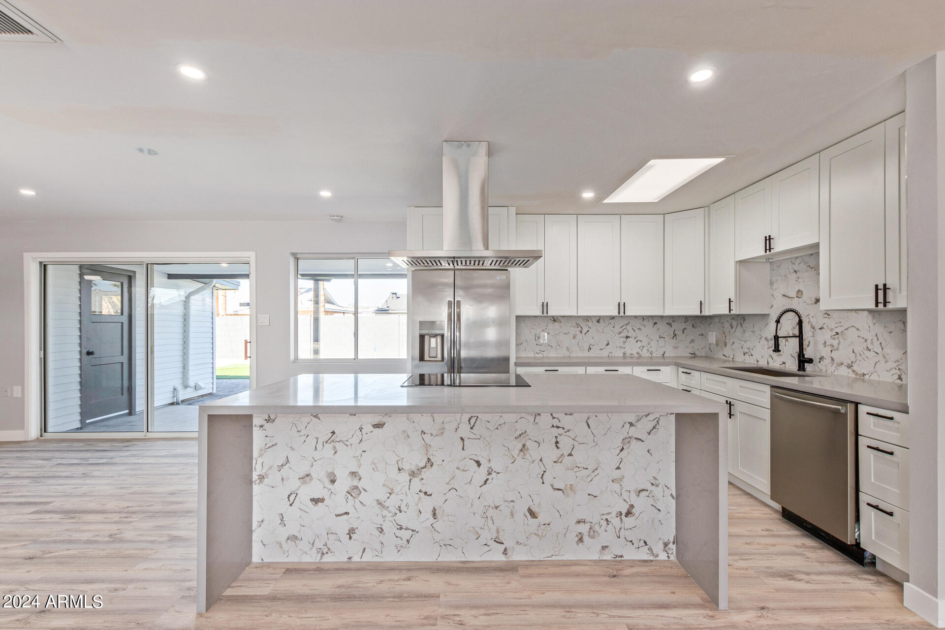 7008 E LATHAM Street