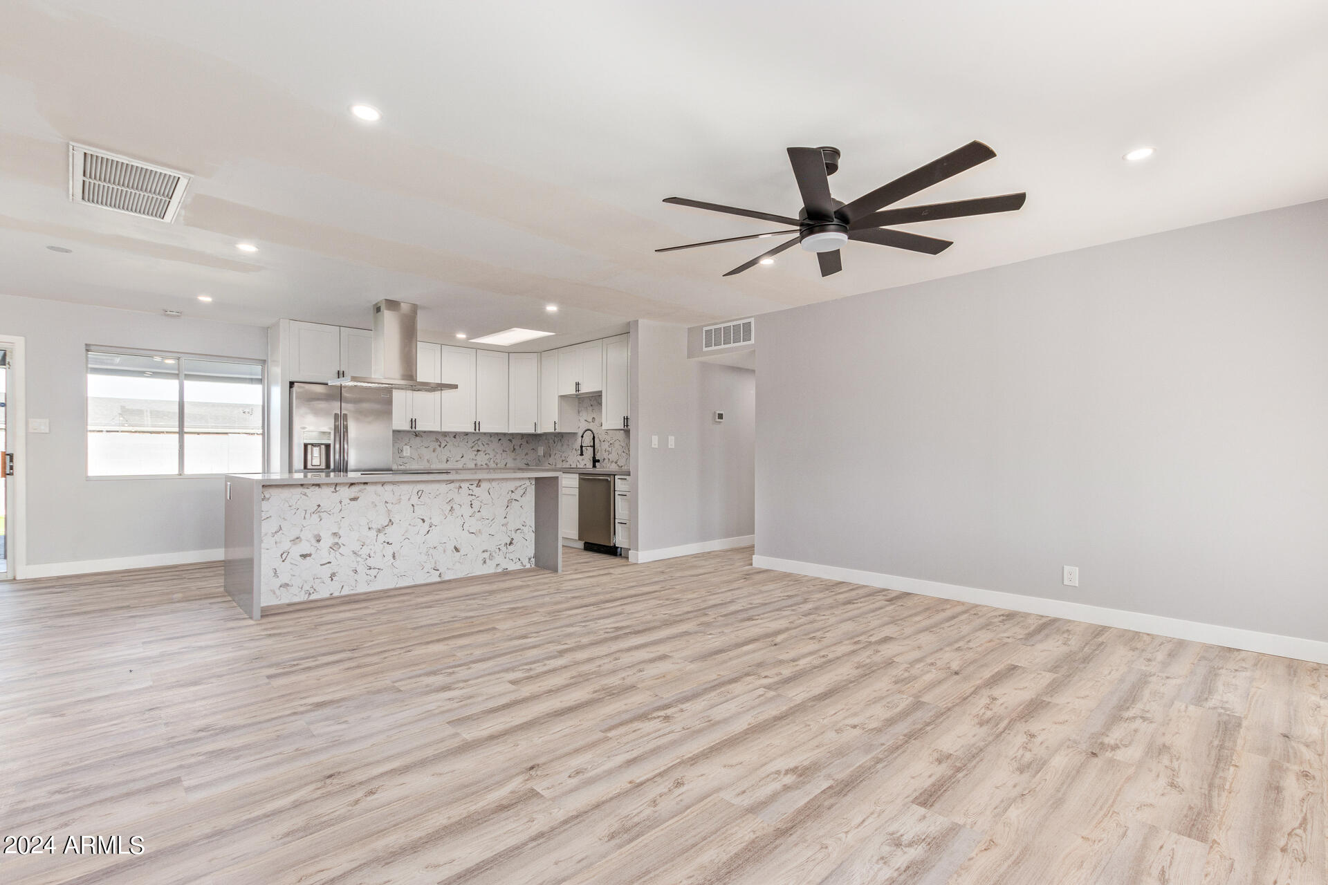 7008 E LATHAM Street