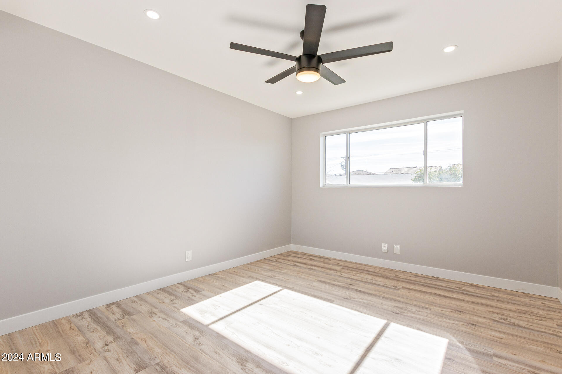 7008 E LATHAM Street