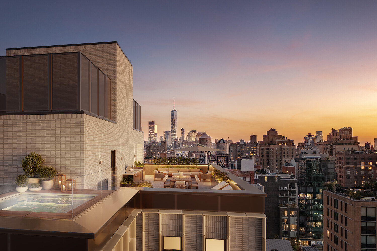 Rooftop terrace with a plunge pool and lounge seating overlooking the Manhattan skyline at sunset.
