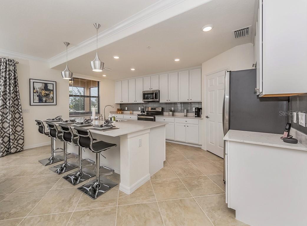 10792 TARFLOWER DR #102