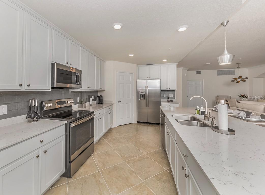 10792 TARFLOWER DR #102