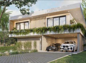 Contemporary home with a glass balcony, cascading greenery, and two cars parked beneath a covered carport.