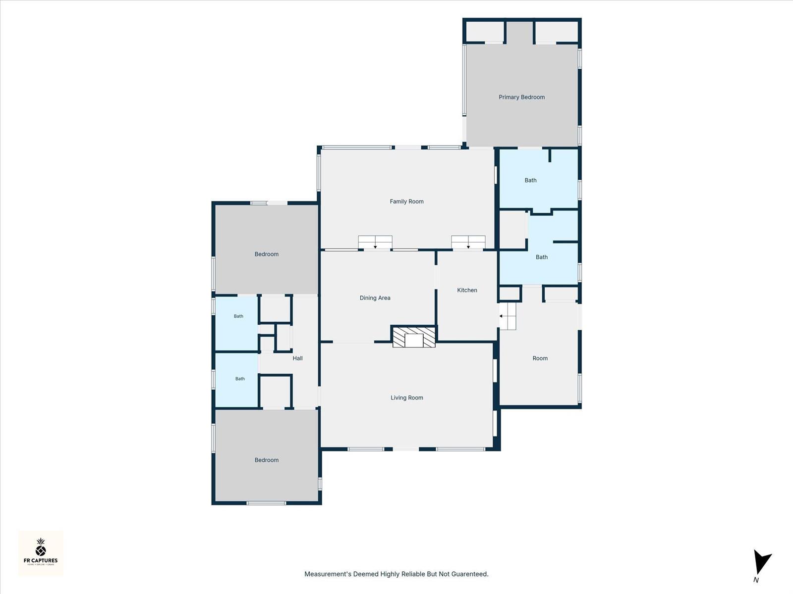 Floor plan showing bedrooms, bathrooms, living and family rooms, dining area, and kitchen.