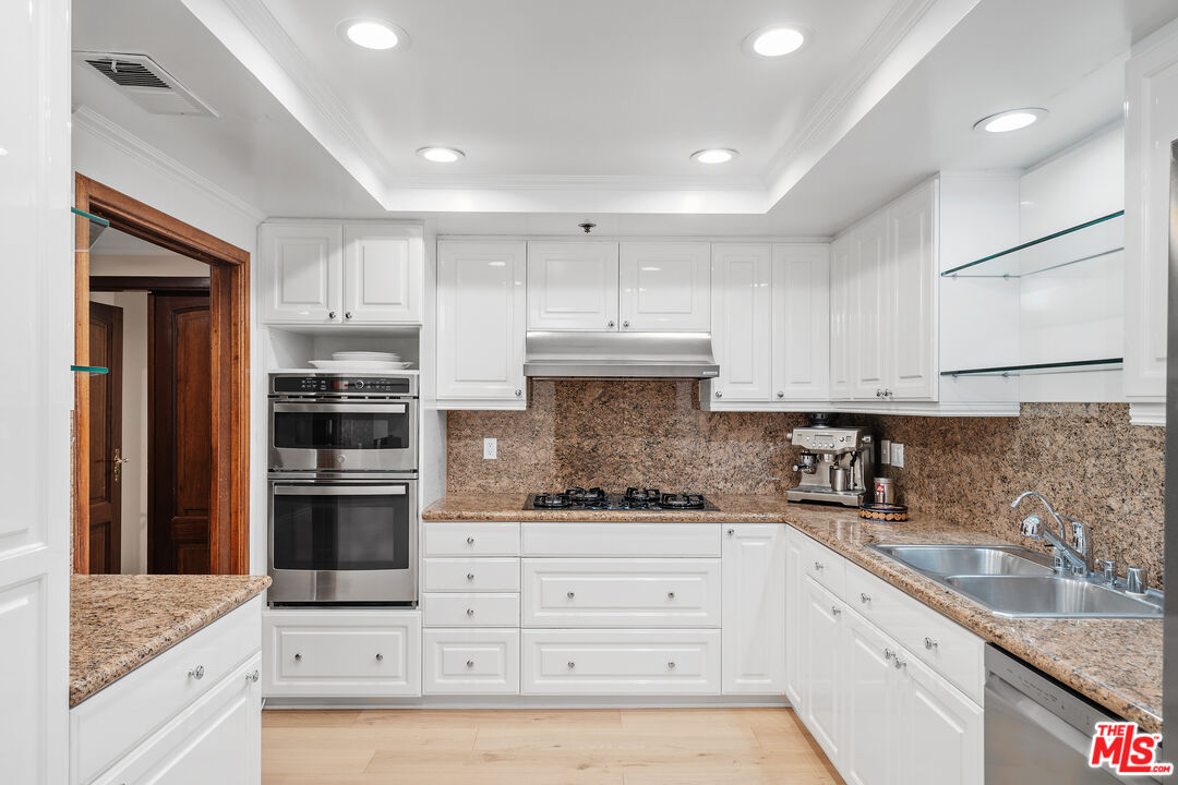 9249 Burton Way Unit: 302