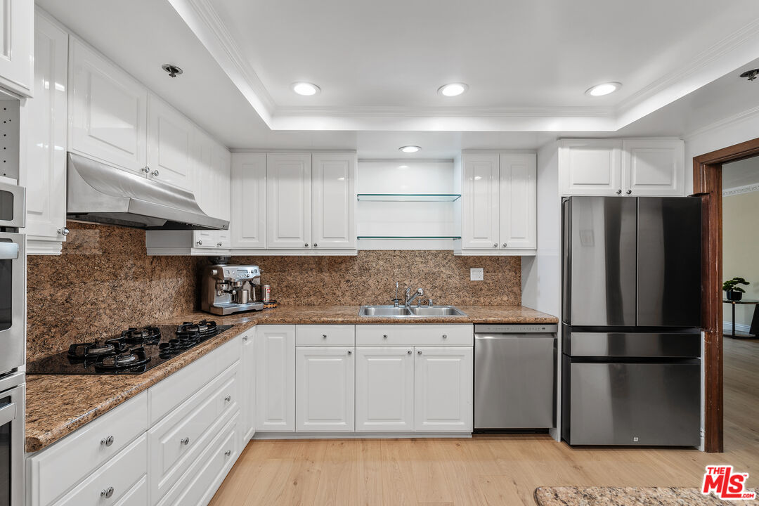 9249 Burton Way Unit: 302