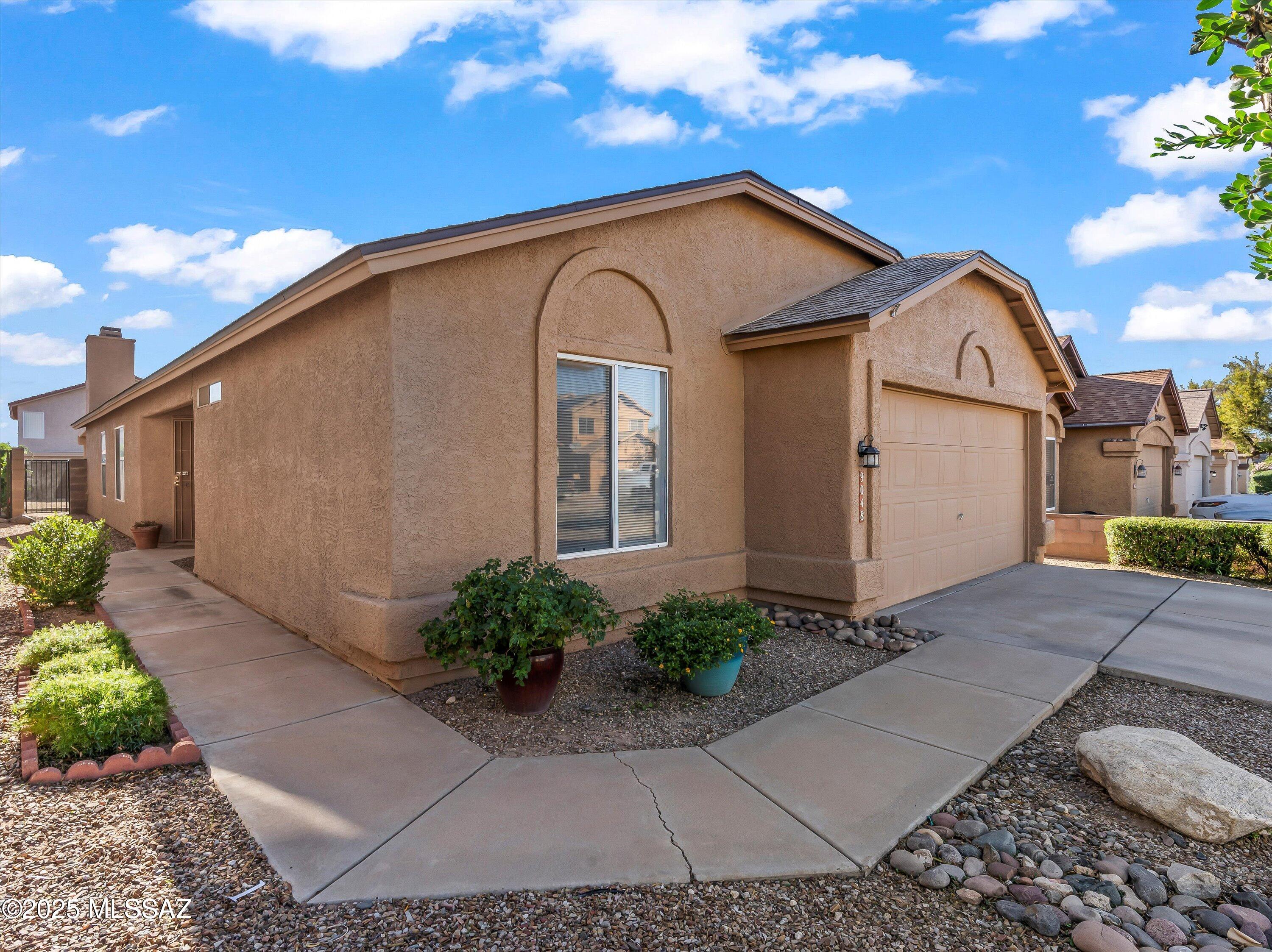 9048 E Orchid Vine Drive
