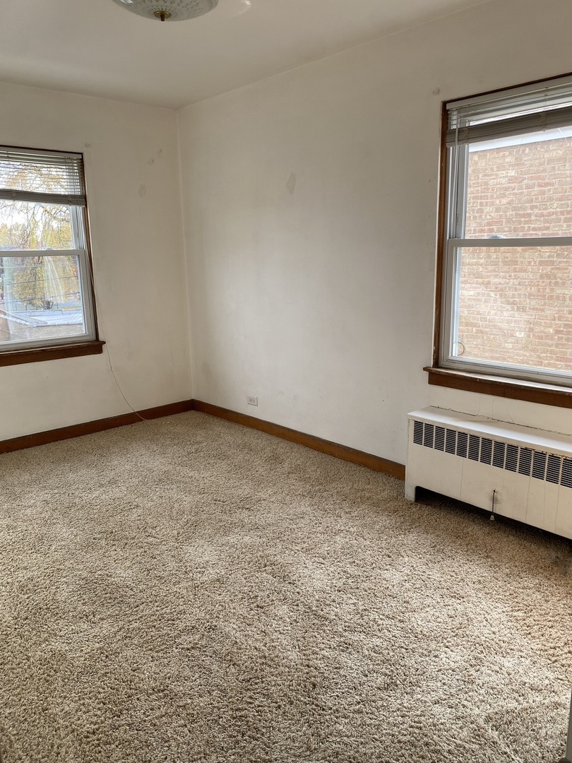 6909 W Addison Street Unit: 2W