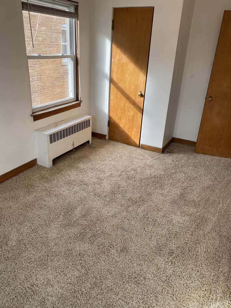 6909 W Addison Street Unit: 2W