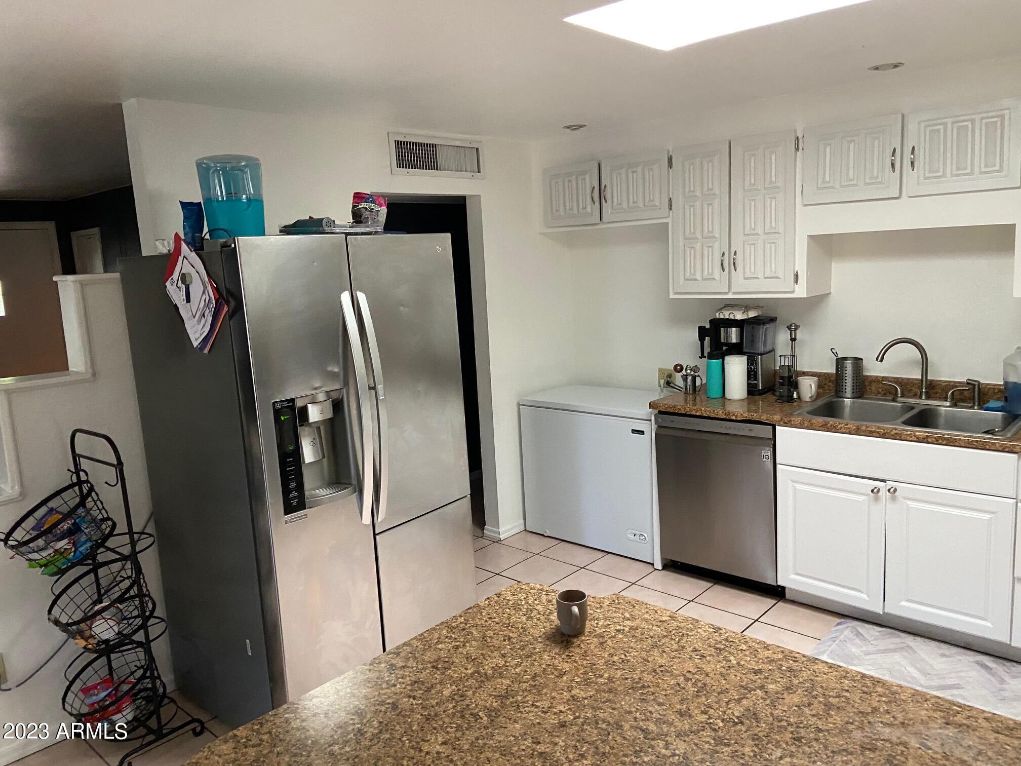 4034 E SURREY Avenue