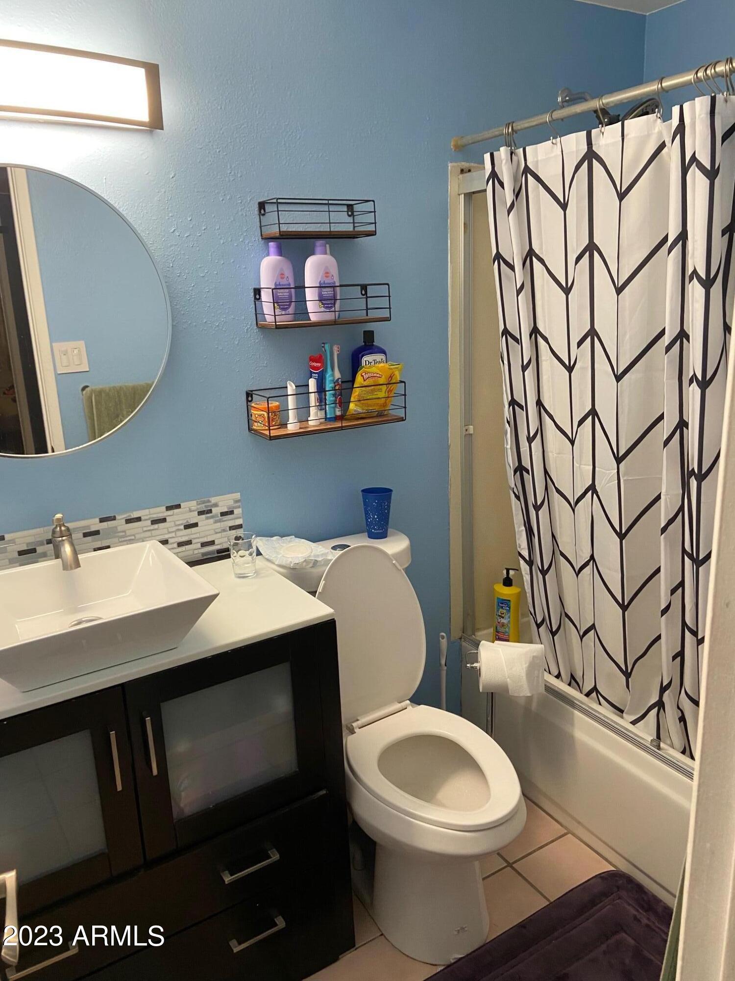 4034 E SURREY Avenue