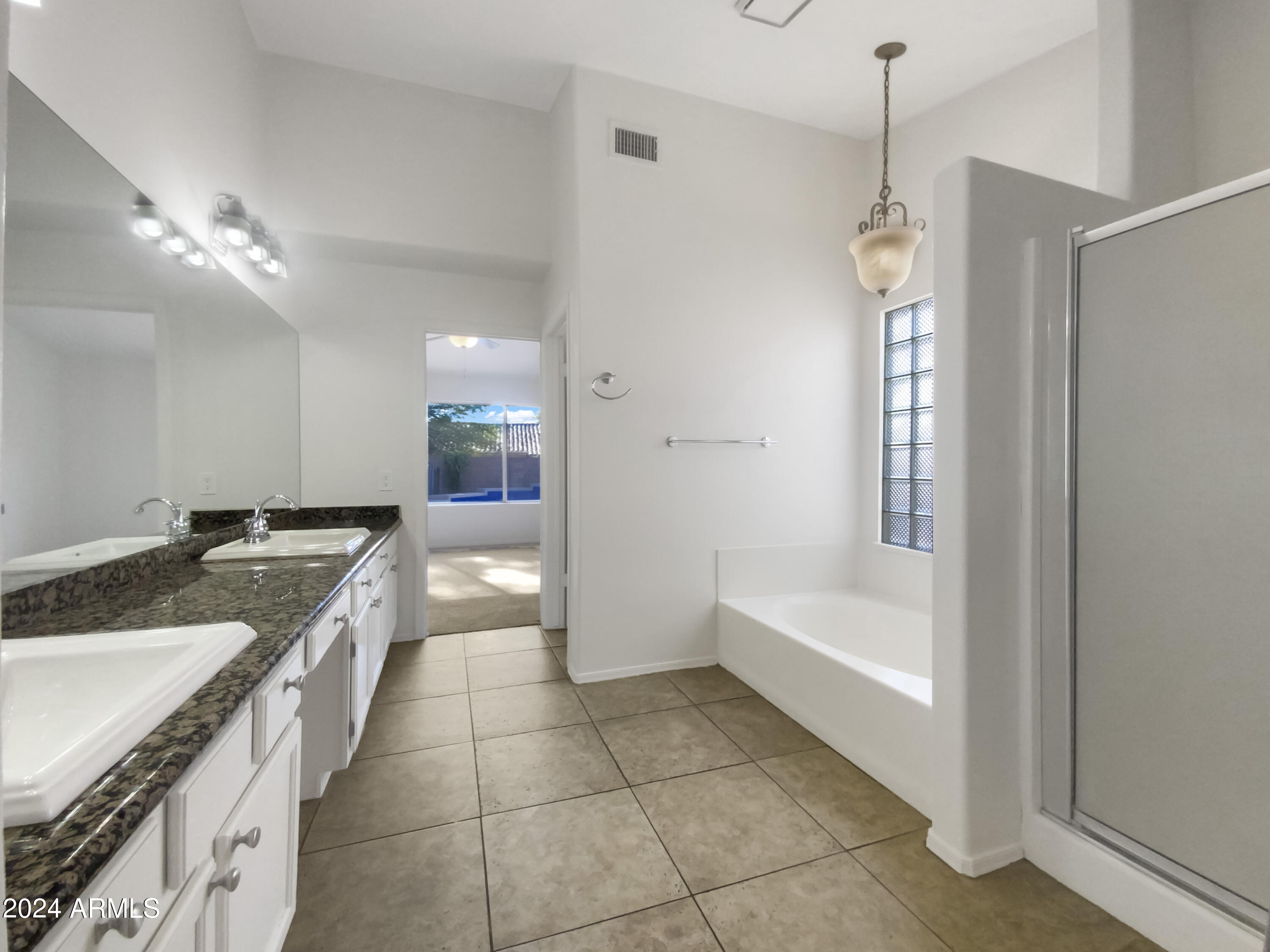 6411 E RIVERDALE Street