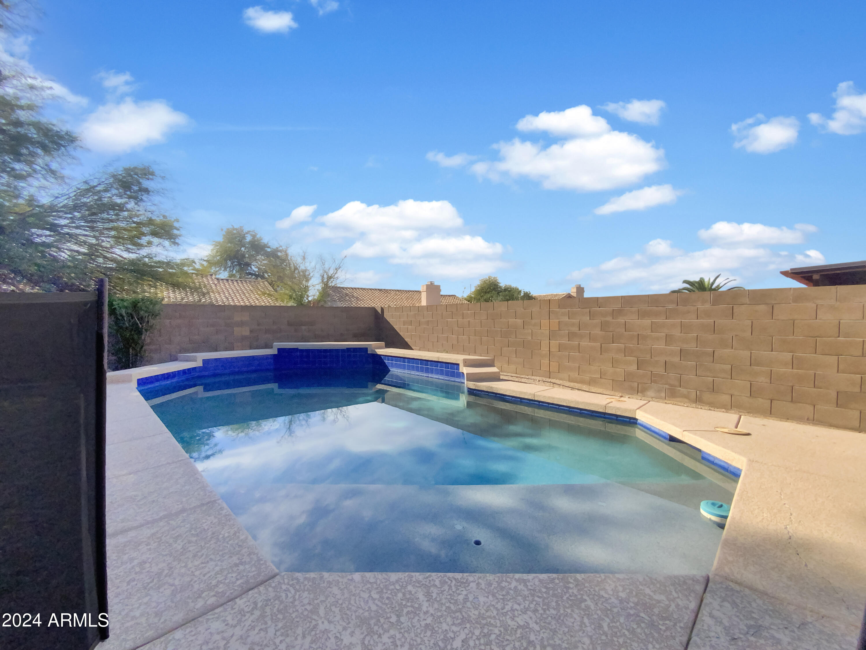 6411 E RIVERDALE Street