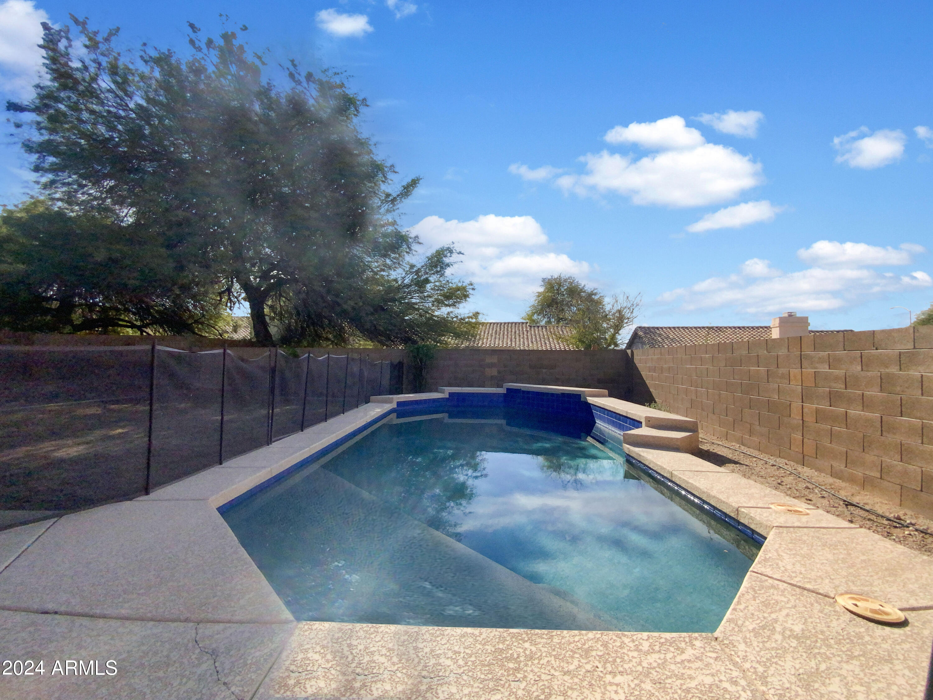 6411 E RIVERDALE Street