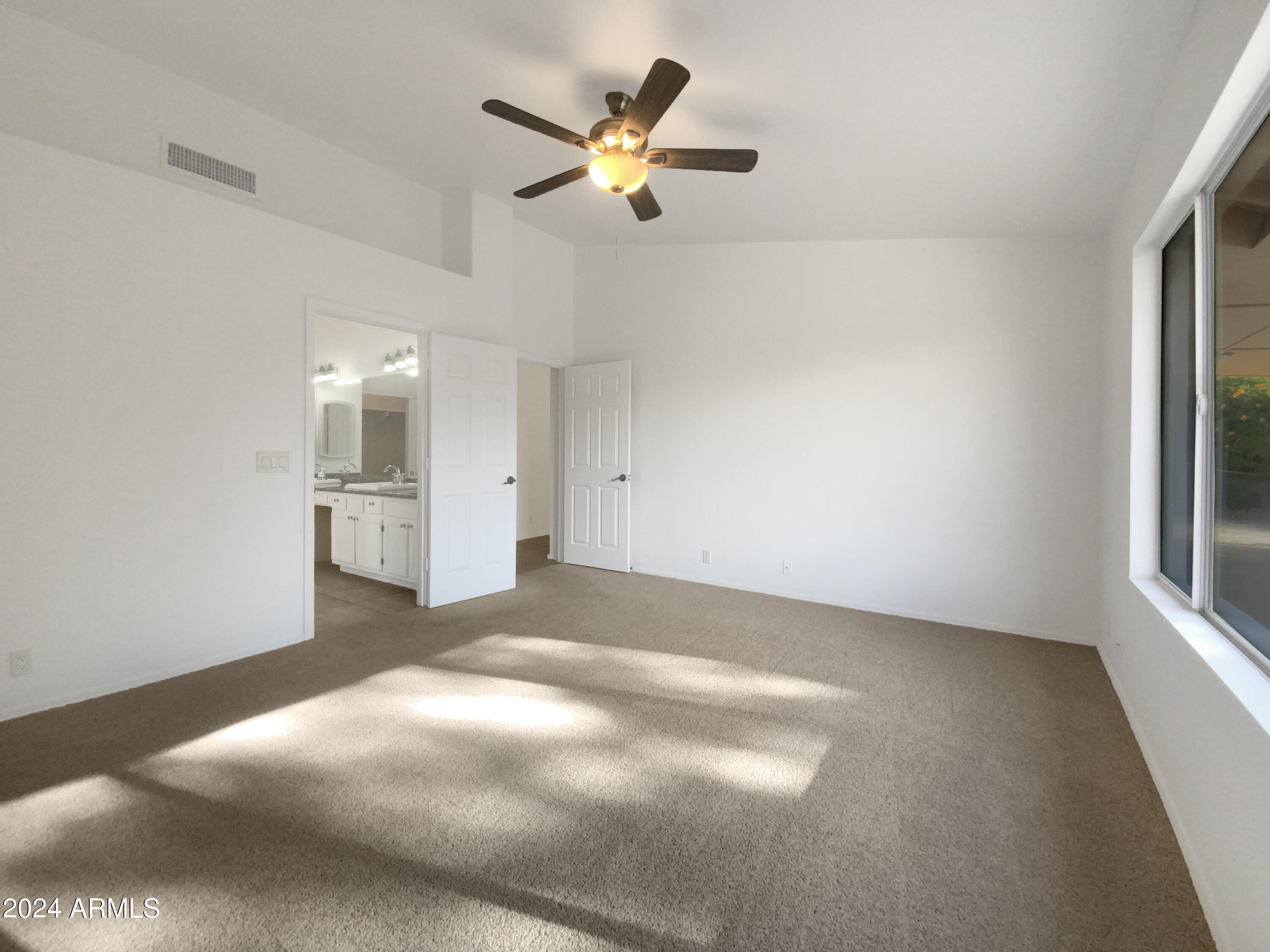 6411 E RIVERDALE Street