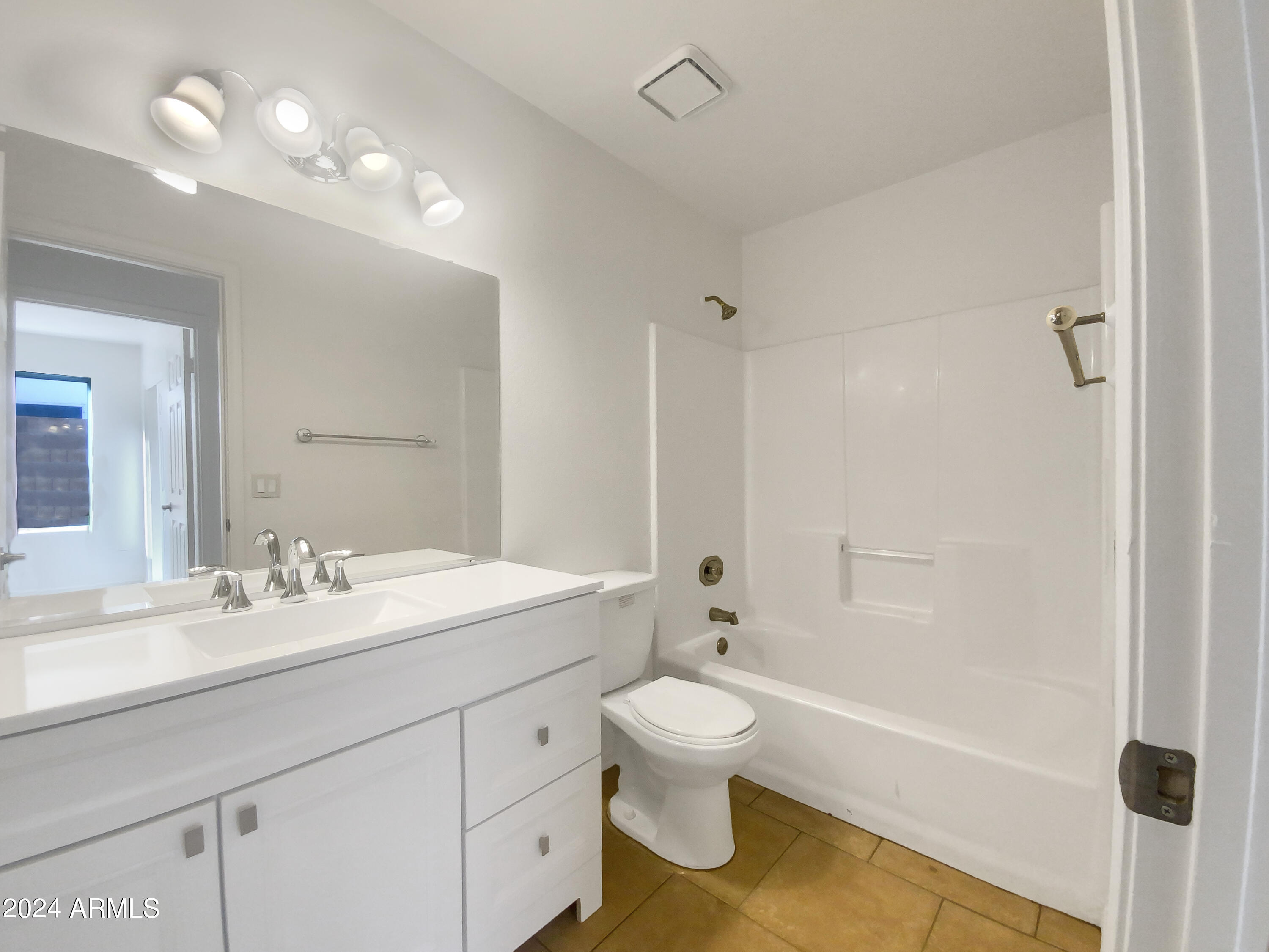 6411 E RIVERDALE Street