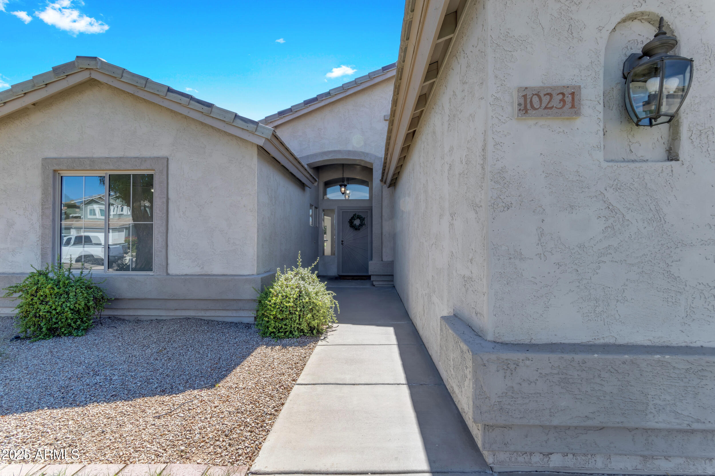 10231 E OLLA Avenue