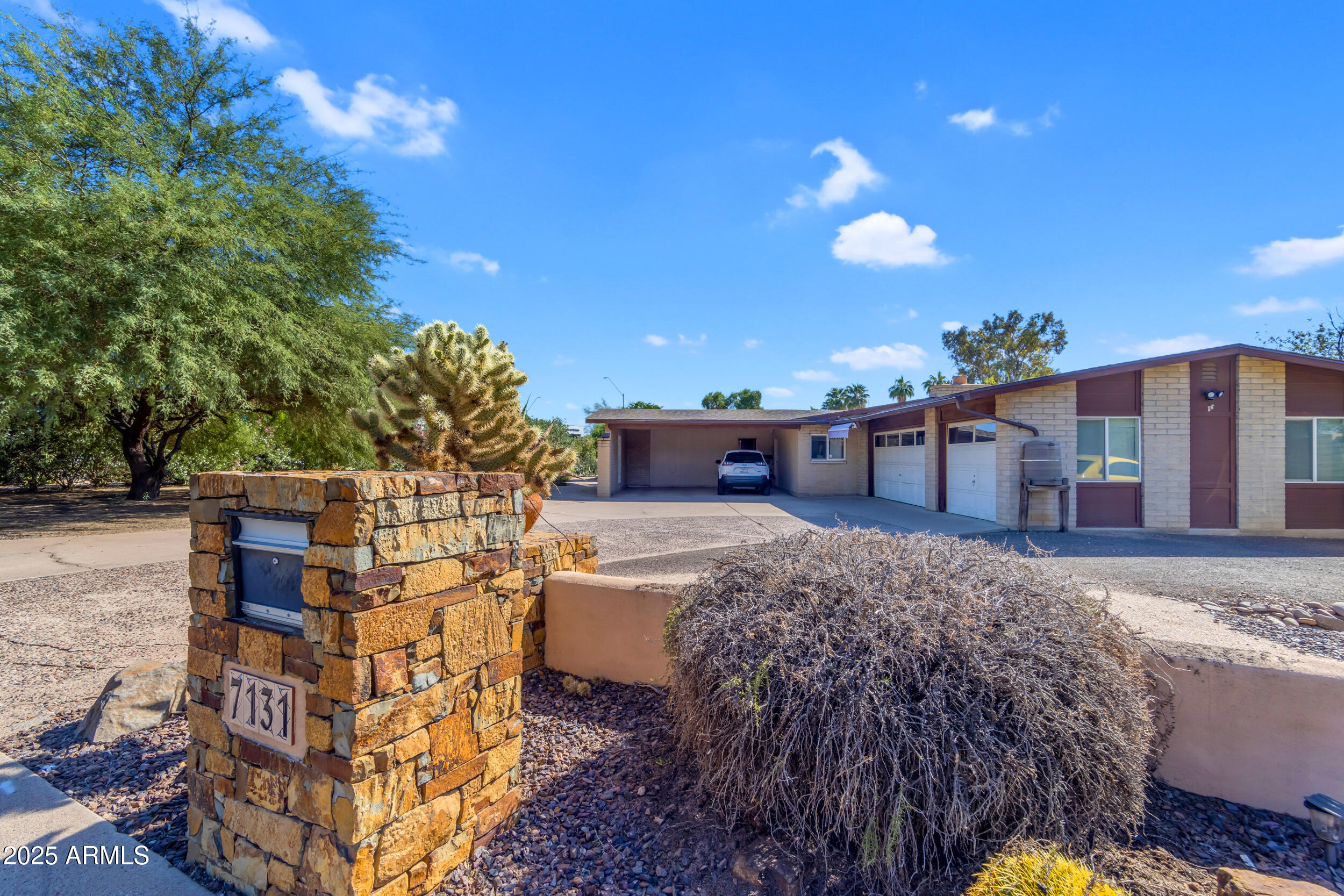 7131 E CHOLLA Street