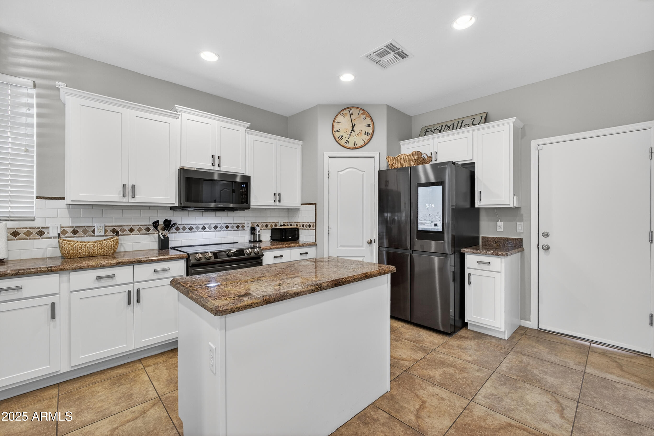 3529 E LOWELL Avenue