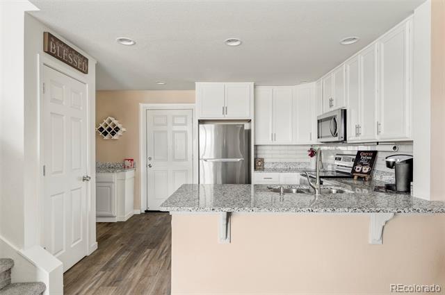 9777 E 56th Place