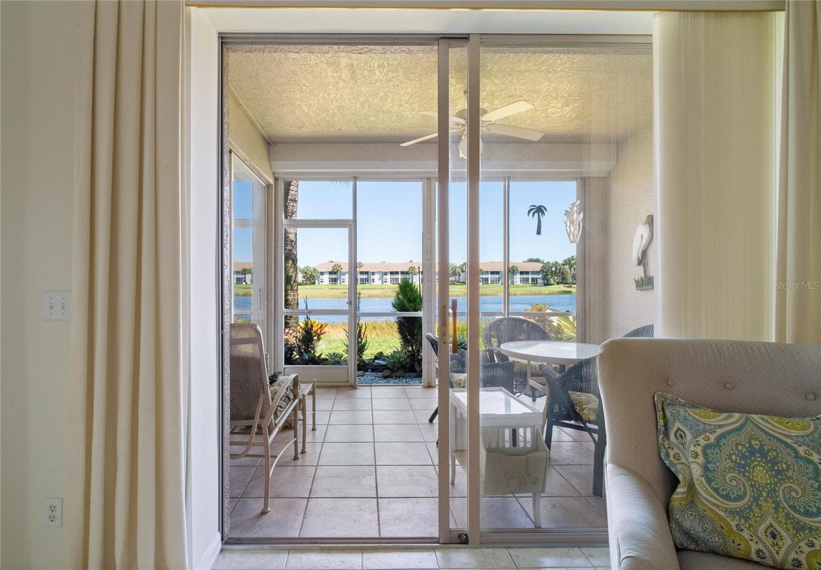 8099 QUEEN PALM LN #211