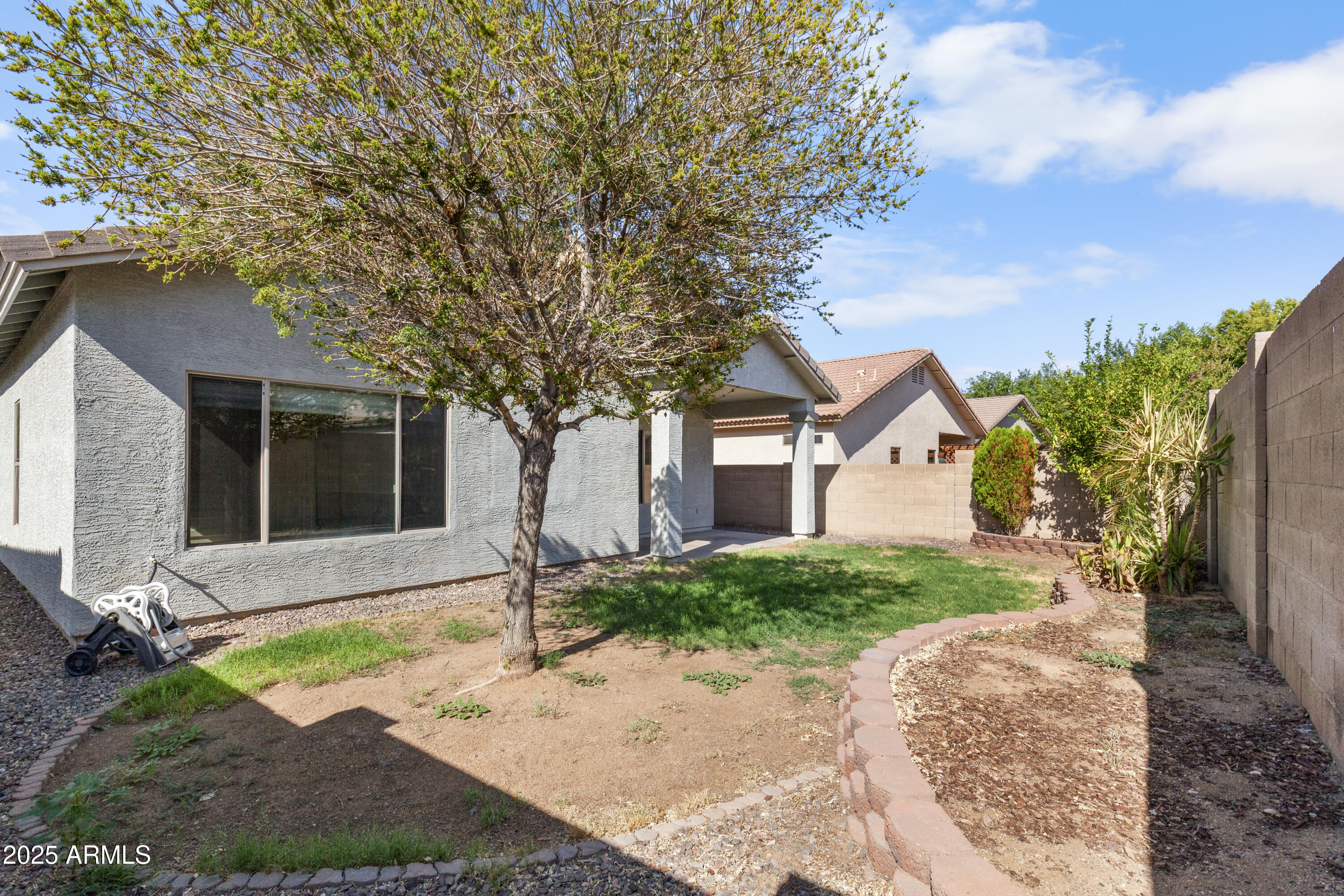 12909 W ASTER Drive