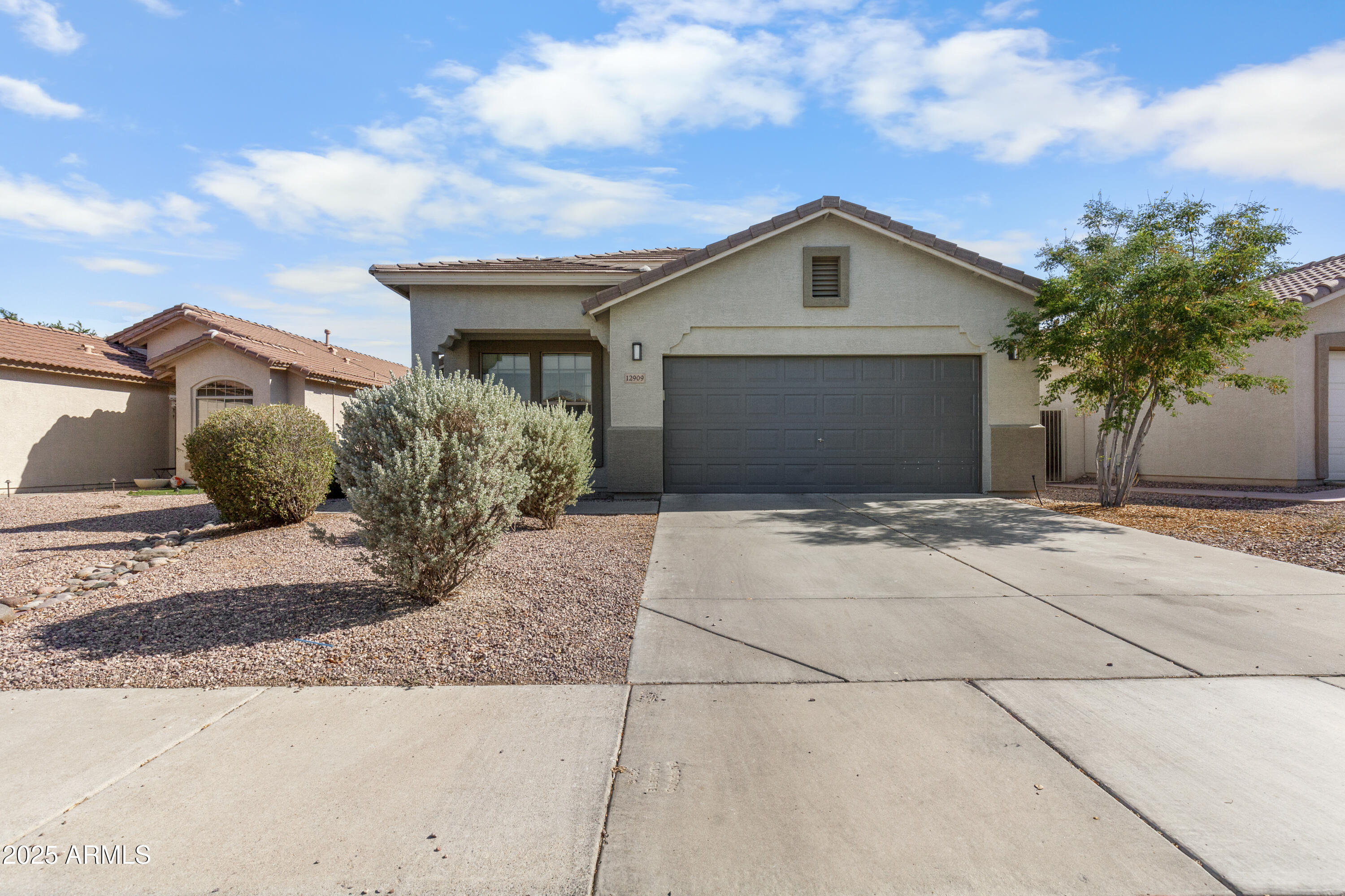 12909 W ASTER Drive