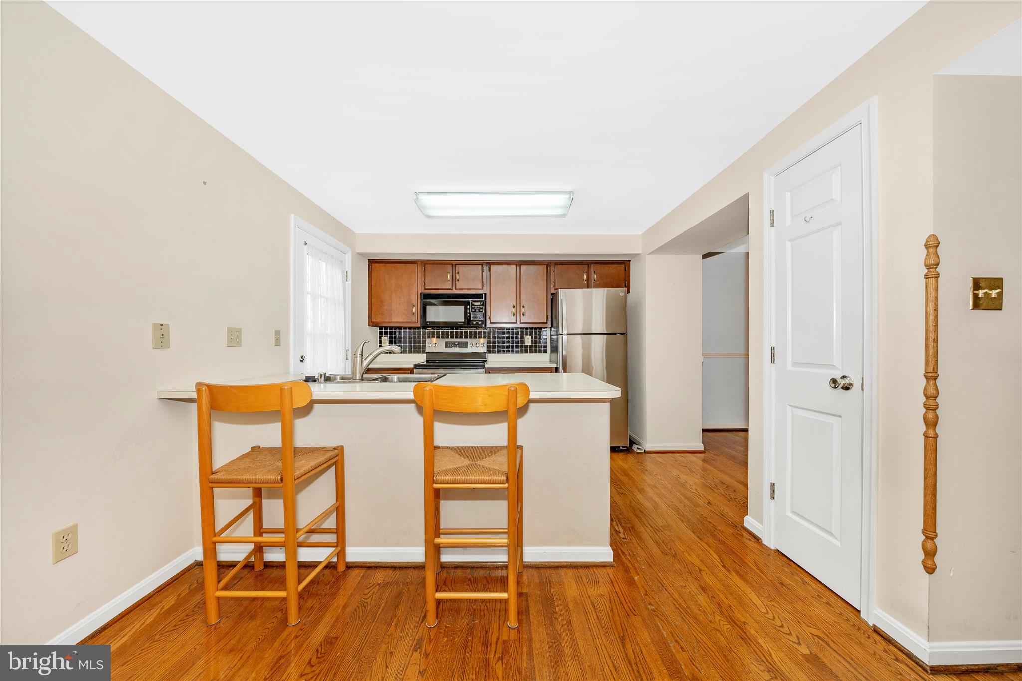 8007 BROKEN REED COURT