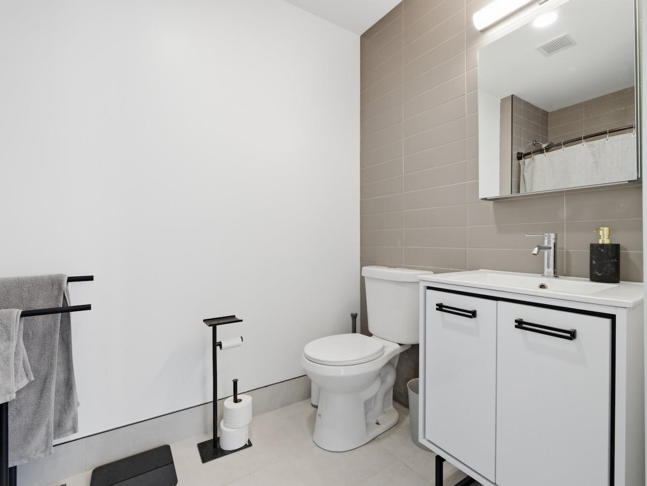 327 COMMUNIPAW AVE Unit: 203