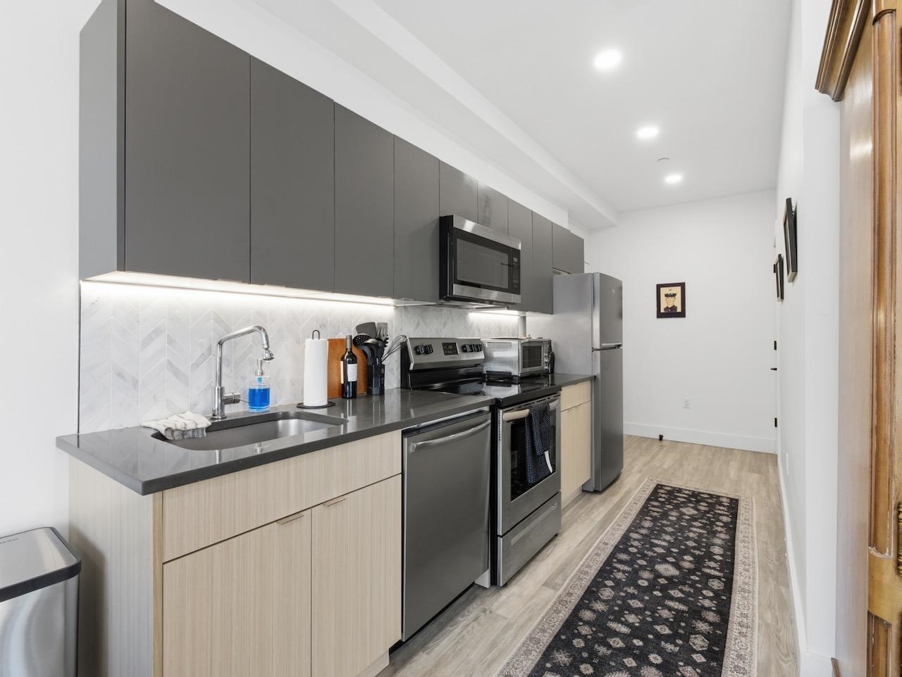 327 COMMUNIPAW AVE Unit: 203