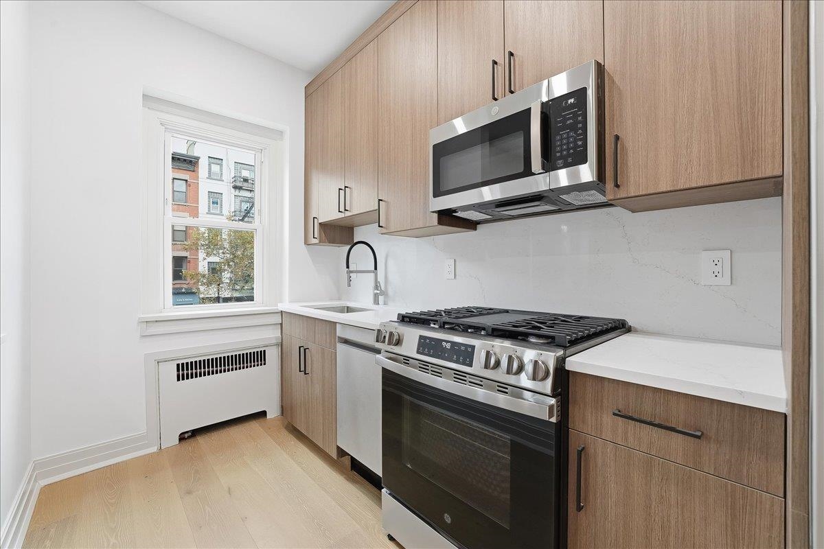 1027 WASHINGTON ST Unit: 2F
