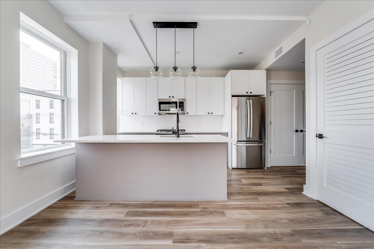 237 WASHINGTON ST Unit: 402