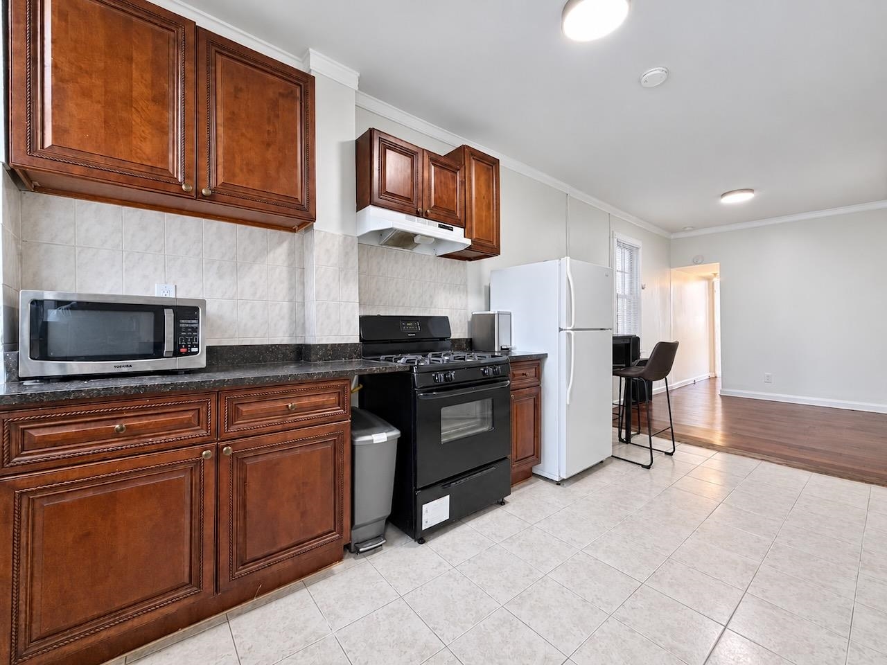 59 WEBSTER AVE Unit: 1