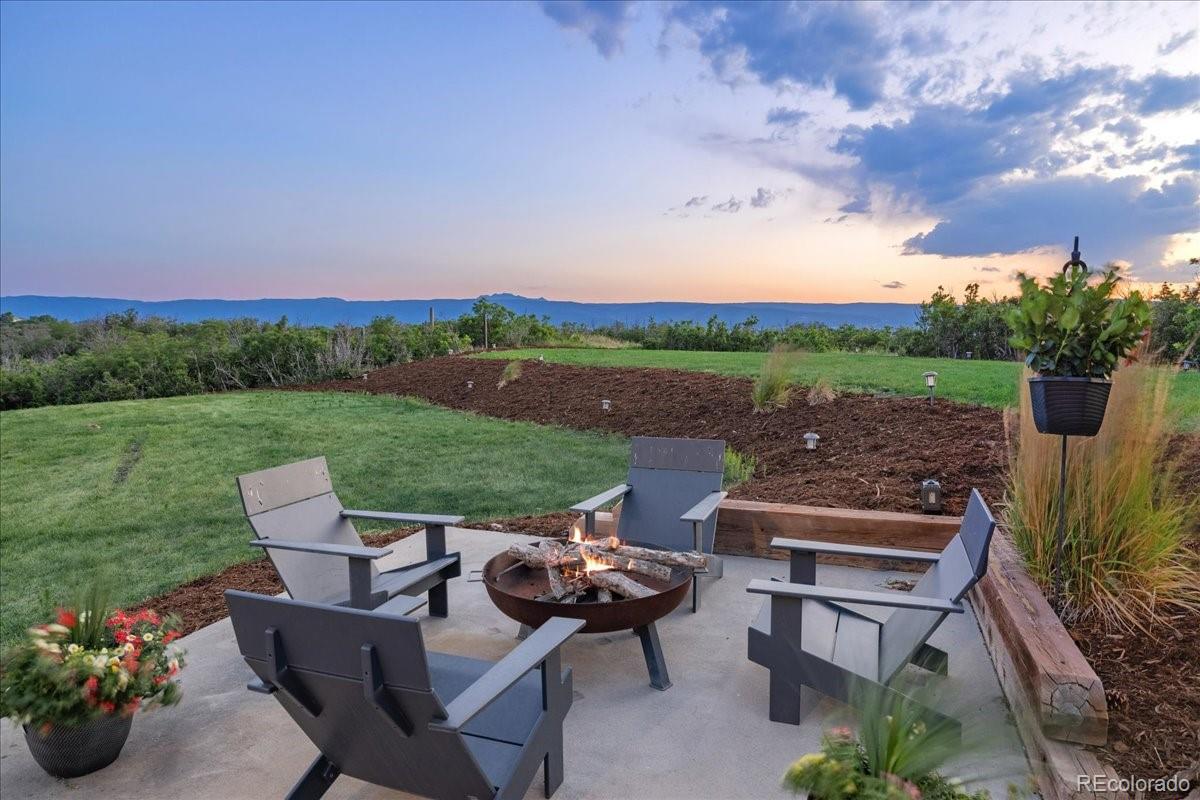 Fire pit patio with panoramic sunset views