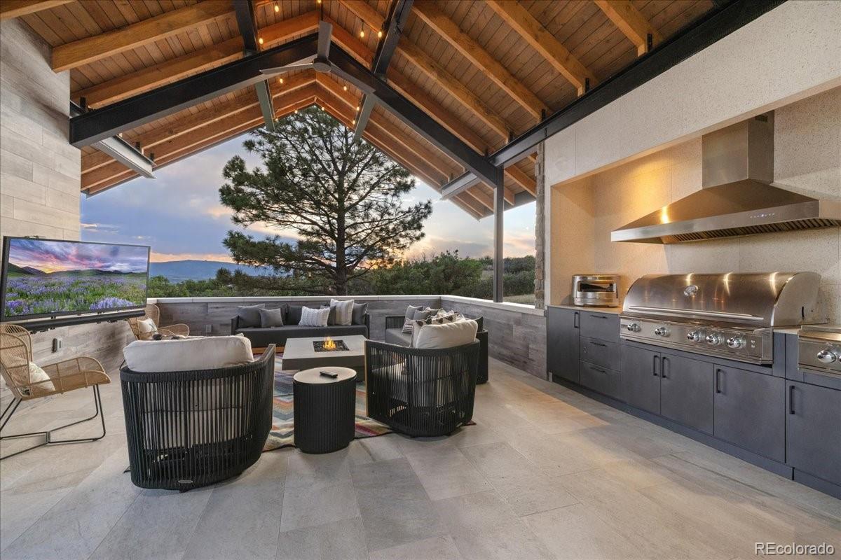 Covered outdoor kitchen and dining pavilion