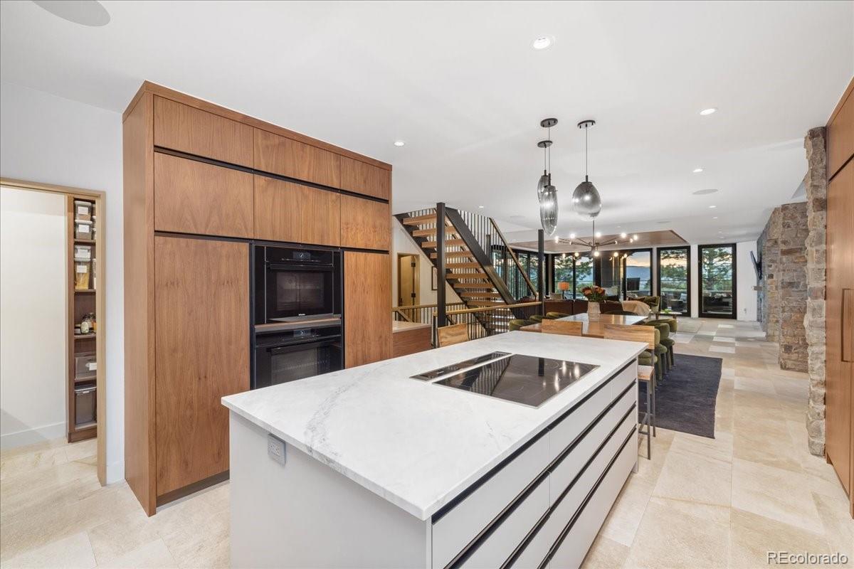 Kitchen island with Artisan Custom Cabinetry, Castle Rock estate